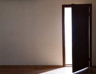 Open door with bright light outside