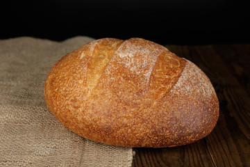 Loaf of bread on dark background
