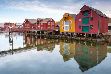Red and yellow wooden houses in Norwegian fishing village