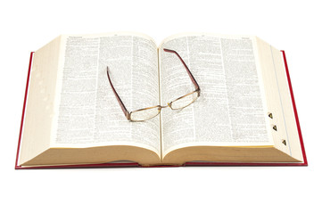 Open dictionary and eyeglasses