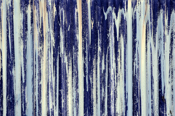 blue paint streaks on corrugated iron