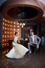 Bride and groom in  interior