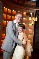 Bride and groom in  interior