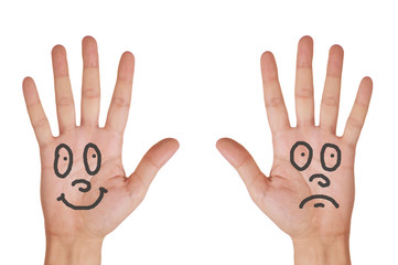 Hands with smile faces isolated on white