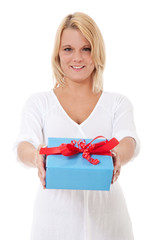 Attractive young woman hands over present