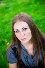 Fototapeta premium Beautiful young girl in meadow