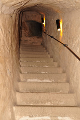 Log in stone built tunnel.