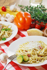 Pasta carbonara on the wooden table