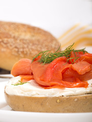 Freshly baked bagel with cream cheese and lox