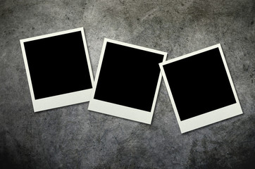 Polaroid photo frames on grunge background