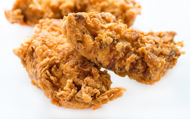 Crunchy chicken strips over light background