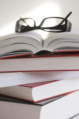books with glasses