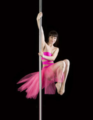 Modern Poledancer in bright pink dress