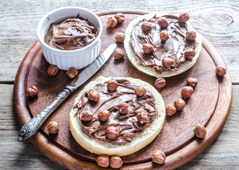 Bun slices with chocolate cream and nuts