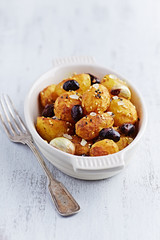 Oven-Baked Potatoes with Kalamata Olives, Turmeric and Sesame Se