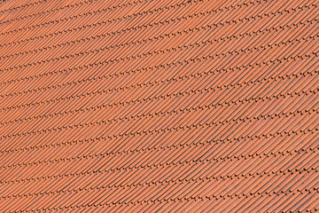 Background of red roof tiles