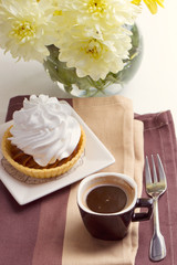 Coffee and cake with whipped cream