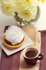 Coffee and cake with whipped cream