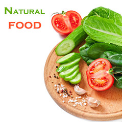 Fresh vegetables on the white with space for text