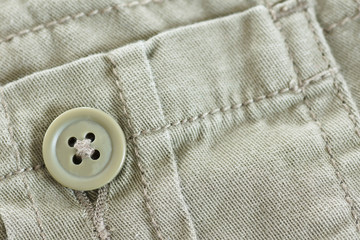 Khaki pocket with button