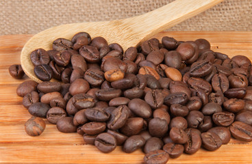 Coffee beans on a wooden lattice