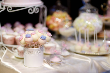 Wedding cake pops decorated with sugar flowers