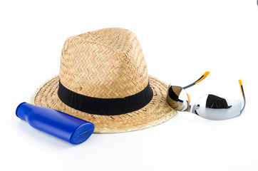 Hat , sunglasses , body lotion isolated on white background