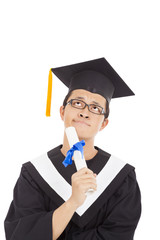 confusing graduation man thinking  and holding diploma