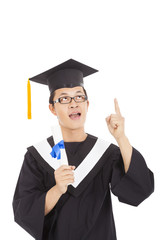 graduation student thinking some ideas and holding diploma