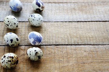 quail eggs on wooden background