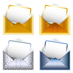 Set of patterned silver and golden paper envelopes with a postca
