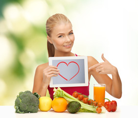 woman with fruits, vegetables and tablet pc