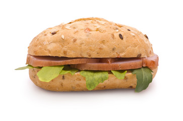 Sandwich with Ham and Arugula isolated on white