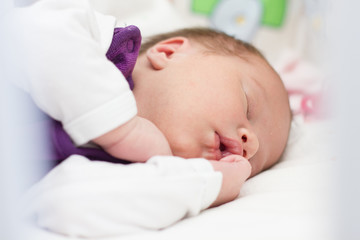Fototapeta na wymiar Cute newborn baby sleeping