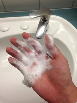 washing hand by cleaning soap
