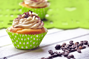 Tasty cupcakes with butter cream