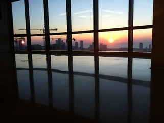 Fototapeta premium Sunset through window