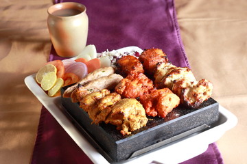 Kebab Platter are small pieces of meat on skewers