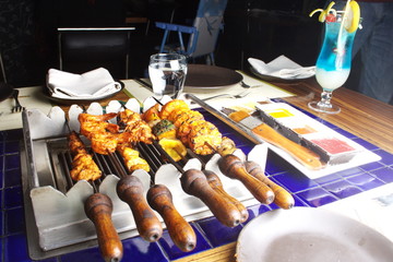 Barbecue Kebab Platter are small pieces of meat on skewers