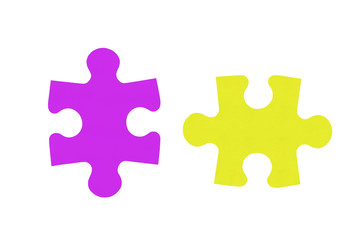 Obraz premium Colorful puzzles closeup isolated on white background