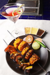 Barbecue Kebab Platter are small pieces of meat on skewers