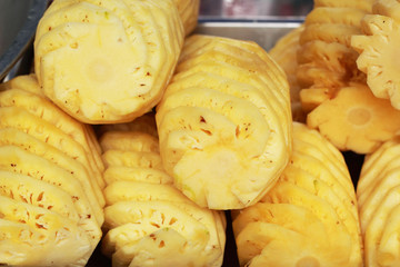 Close-up fresh pineapple place stacked