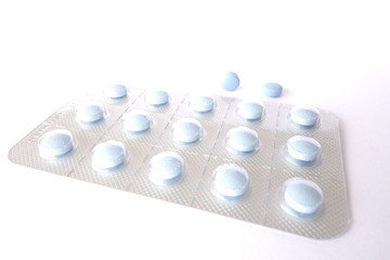 Obraz na płótnie Canvas niebieskie tabletki leki