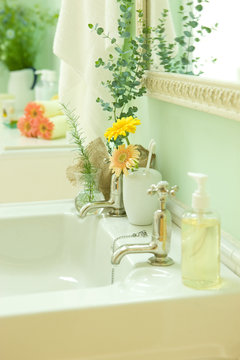 Restroom decorated with eucalyptus and Sissinghurst rosemary