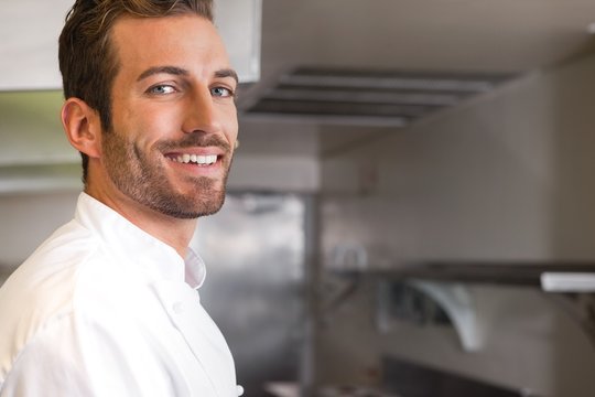 Cheerful Young Chef Looking At Camera