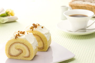 Swiss roll and coffee