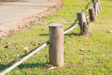 wood fence around  the side of the road