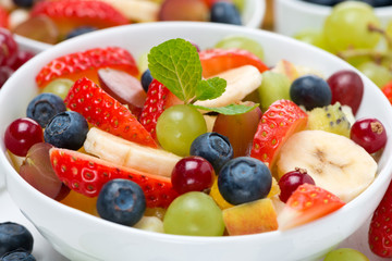 delicious fruit and berry salad, close-up, selective focus
