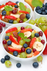 delicious fruit and berry salad, vertical