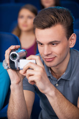 Fototapeta premium Man pirating at the cinema.